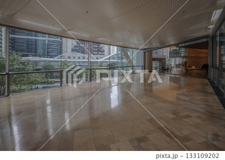 Oct 29 2025 Quarry Bay Streetscape Through Office Lobby Glass Oct 29 2025 Quarry Bay Streetscape Through Office Lobby Glass 133109202