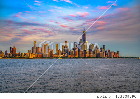 New York City Skyline showing Lower Manhattan and World Trade Center at Sunset 133109390