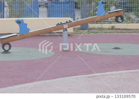 Empty spring rider playground equipment designed for two children to play together 133109570