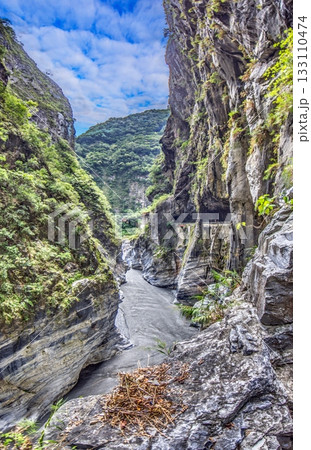 Taroko Gorge cliff trail and river in Taiwan panorama Taroko Gorge cliff trail and river in Taiwan panorama 133110474