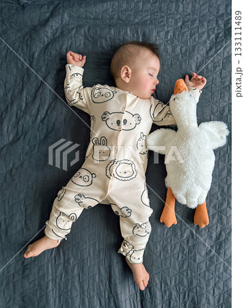 Sleeping Baby with Plush Duck Toy Sleeping Baby with Plush Duck Toy 133111489