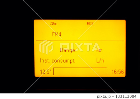 old car trip computer screen with radio and fuel consumption indicator old car trip computer screen with radio and fuel consumption indicator 133112084