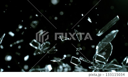 Freeze Motion Shot of Breaking Real Glass Isolated on Black Background Freeze Motion Shot of Breaking Real Glass Isolated on Black Background 133115034