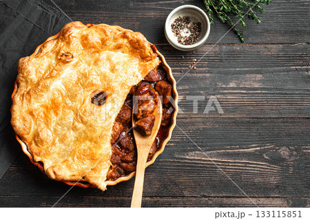 Beef steak pie with crispy puff pastry Beef steak pie with crispy puff pastry 133115851