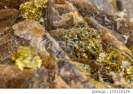Macro mineral stone Barit Pyrit on a white background 133118329