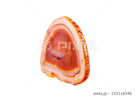 Macro mineral orange agate in crystals on white background Macro mineral orange agate in crystals on white background 133118346