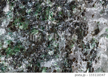Macro mineral stone Fuchsite on a white background 133118347