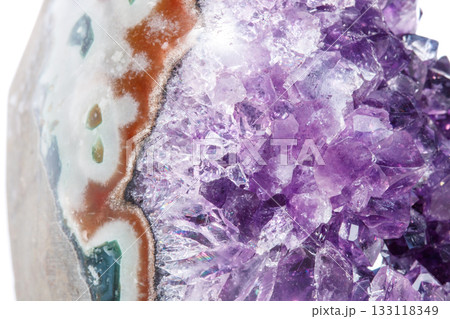 Amethyst Crystal Druse macro mineral on white background Amethyst Crystal Druse macro mineral on white background 133118349