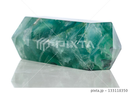 Macro mineral stone Fluorite crystal on a black background 133118350
