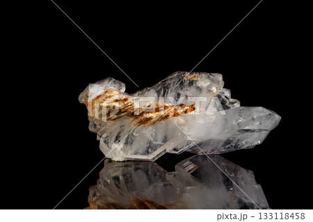 Macro mineral stone Flattened crystal of rock crystal on a black background Macro mineral stone Flattened crystal of rock crystal on a black background 133118458