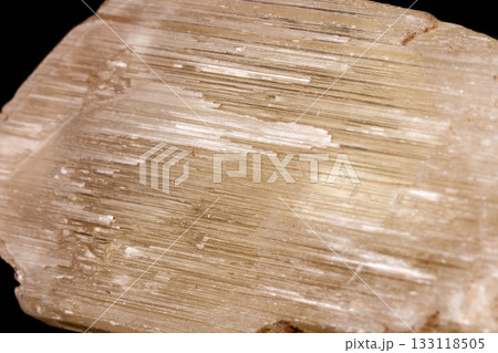 Macro mineral stone Spodumene on a black background 133118505