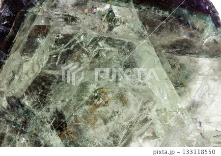 Macro of a mineral stone Fluorite on a white background 133118550