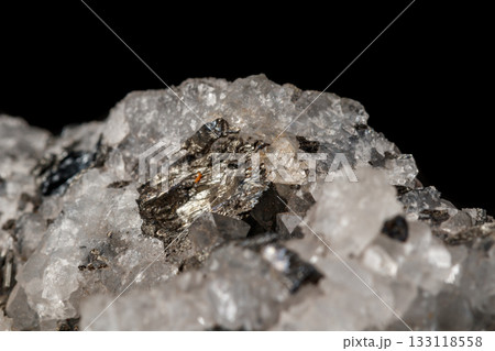 Macro mineral stone Stibnite quartz on a black background 133118558