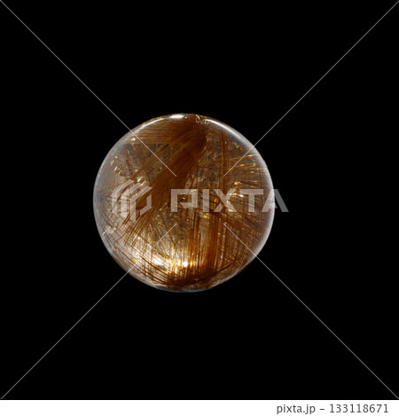 Ball of quartz with rutile on a black background 133118671