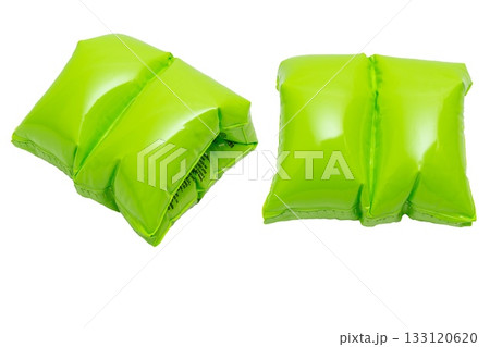 Bright green inflatable swim arm bands for child safety in water Bright green inflatable swim arm bands for child safety in water 133120620