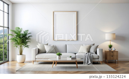 白壁のシンプルな部屋に飾られたポスター 133124224