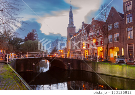 Sunset view of canal and tower in Leiden Netherlands Sunset view of canal and tower in Leiden Netherlands 133126912