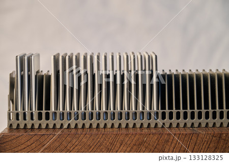 Slide rack for projection against White wall background 133128325