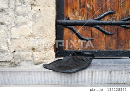 Woman bag on church porch 133128351