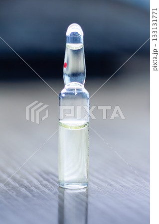 Glass medical ampoule with medicine Glass medical ampoule with medicine 133131771