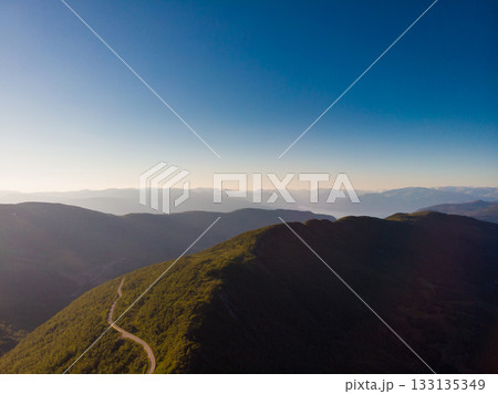 Road trough mountains Norway. Aerial view 133135349