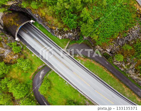 Aerial view. Road with tunnel in mountains Norway Aerial view. Road with tunnel in mountains Norway 133135371