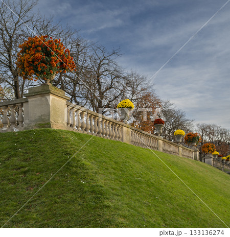 Luxembourg Gardens in Paris with autumn flowers and sculptures 133136274