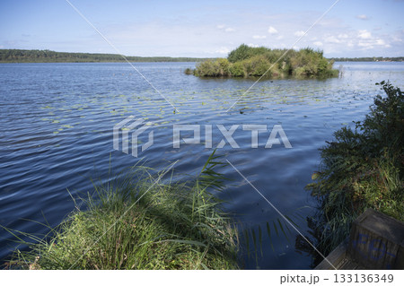 Scenic view of Lac de Leon with natural beauty and calm waters 133136349