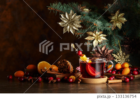 Cranberry drink with spices and citrus fruits. 133136754