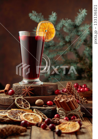 Hot Christmas drink with spices, dried citrus, and cranberries. Hot Christmas drink with spices, dried citrus, and cranberries. 133136821