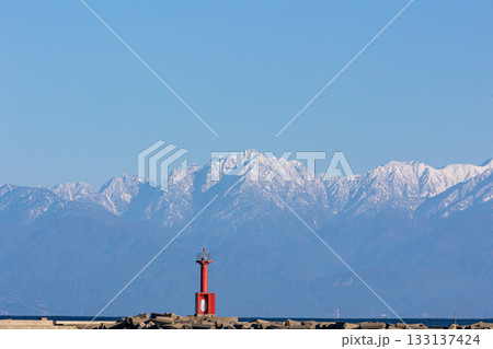 海と雪山の絶景|赤い灯台 海と雪山の絶景|赤い灯台 133137424