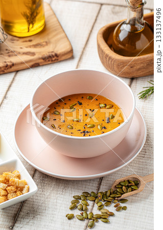 Lentil soup with seeds and croutons Lentil soup with seeds and croutons 133137496