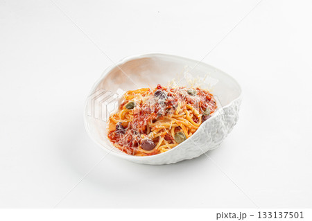 Pasta bowl with tomato olive sauce 133137501