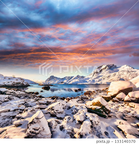 Amazing winter view on Sundstraumen strait at sunset. Amazing winter view on Sundstraumen strait at sunset. 133140370