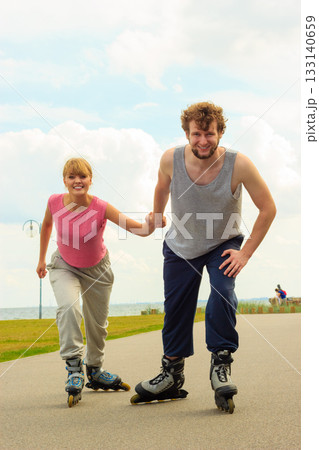 roller skater couple skating outdoor roller skater couple skating outdoor 133140659