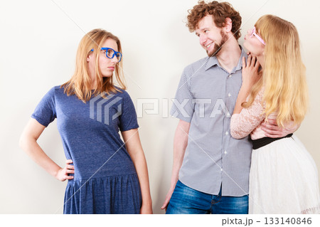 Jealous woman with happy couple 133140846