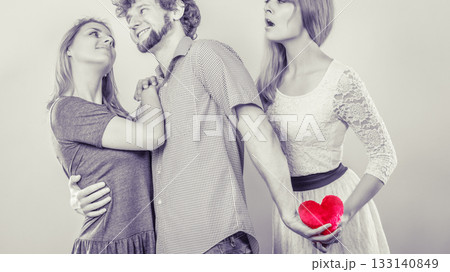 Abandoned woman with enamored couple Abandoned woman with enamored couple 133140849