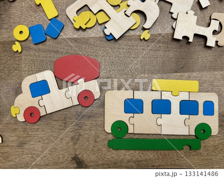 Children's colored educational toys made of wood. High quality photo Children's colored educational toys made of wood. High quality photo 133141486