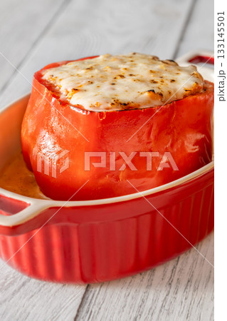 Single red bell pepper baked with bolognese filling and melted mozzarella topping Single red bell pepper baked with bolognese filling and melted mozzarella topping 133145501