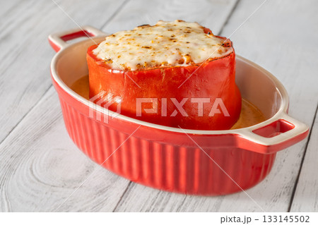 Single red bell pepper baked with bolognese filling and melted mozzarella topping Single red bell pepper baked with bolognese filling and melted mozzarella topping 133145502