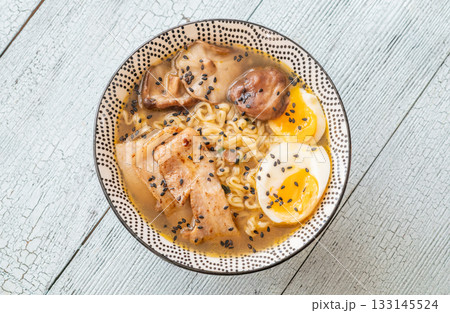 Bowl of ramen with pork belly, soft egg, and shiitake mushrooms 133145524