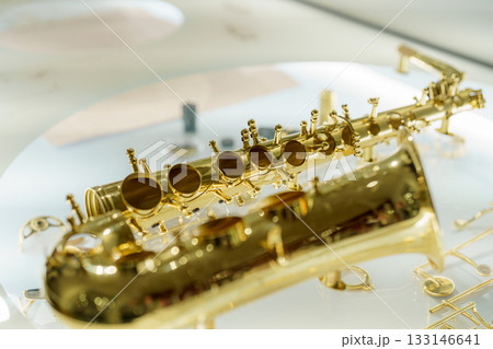 a saxophone in a musical background a saxophone in a musical background 133146641