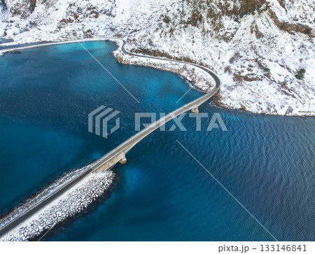 Aerial view of a bridge over turquoise sea in Lofoten Islands 133146841