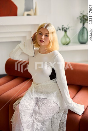 Calm female figure with delicate attire in inviting setting 133147607