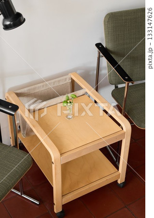 Miniature play object on vintage furniture in cozy space Miniature play object on vintage furniture in cozy space 133147626