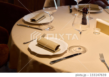 sophisticated table setting ambiance, chic and romantic table decor with sophisticated lighting sophisticated table setting ambiance, chic and romantic table decor with sophisticated lighting 133147639