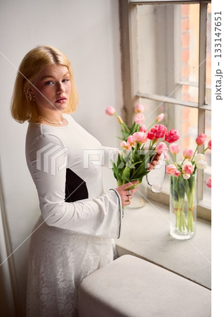 Contemporary minimalist fashion setting with colorful flower Contemporary minimalist fashion setting with colorful flower 133147651