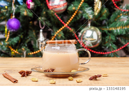 Masala chai in glass cup with Christmas background. 133148195