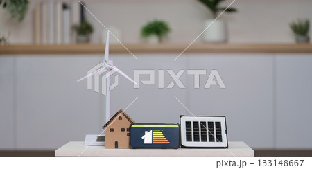 Sustainable living. Renewable energy models showcasing eco-friendly solutions. 133148667