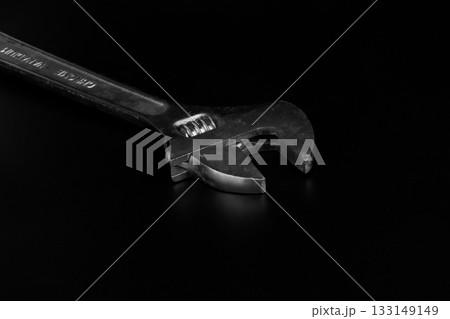 Wrench on a black background 133149149